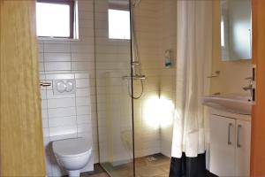 Ein Badezimmer in der Unterkunft Fossatún Country Hotel