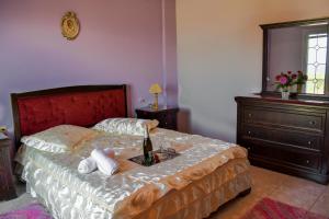 Postel nebo postele na pokoji v ubytování ANEMOS HOLIDAYS HOUSE