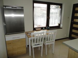 Kuchnia lub aneks kuchenny w obiekcie Apartament wSPAniały.
