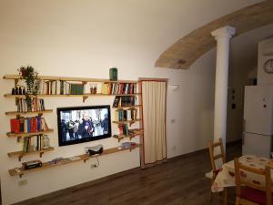 TV a/nebo společenská místnost v ubytování La Casa di Fabio