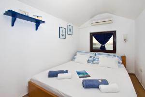 Postel nebo postele na pokoji v ubytování Villa Yvonne