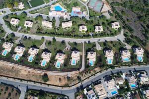 an overhead view of a city with houses and roads at Colina da Lapa & Villas in Carvoeiro