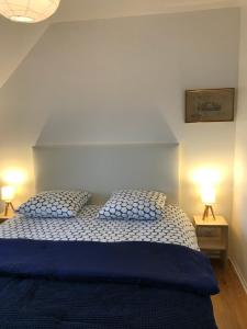 Ein Bett oder Betten in einem Zimmer der Unterkunft Ejoki