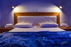 Ένα ή περισσότερα κρεβάτια σε δωμάτιο στο Villa Francesca