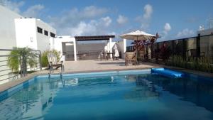 A piscina localizada em Apartamento na Ponta Verde Maceió Facilities ou nos arredores