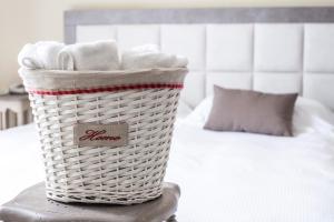 Postel nebo postele na pokoji v ubytování Hotel Le Vigne di Corvino