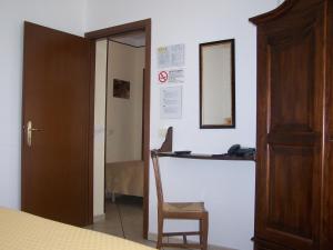 Postel nebo postele na pokoji v ubytování Hotel Ristorante La Torretta