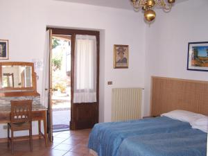 Postel nebo postele na pokoji v ubytování Hotel Ristorante La Torretta