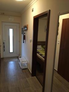 Posteľ alebo postele v izbe v ubytovaní My Home Apartman