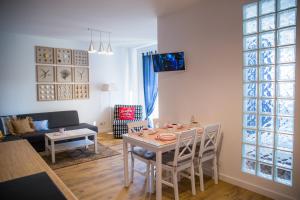 Posezení v ubytování APARTAMENT SEASHELL KOŁOBRZEG BOCIANIE GNIAZDO