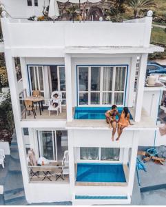 a house with a pool in the middle of it at Bintana Sa Paraiso in Mambajao +291 photos