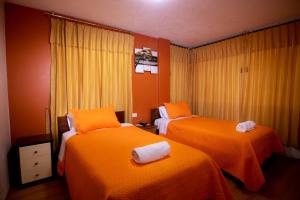 Postel nebo postele na pokoji v ubytování Hostal Alpachaca - New Quito Airport