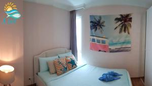 En eller flere senge i et værelse på My resort hua hin A601 + 37 billeder