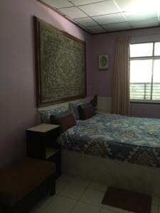 Säng eller sängar i ett rum på Nan Inn Bungalow