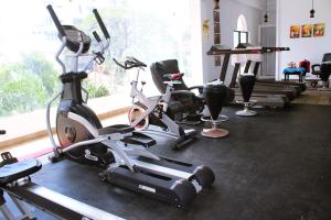 a group of exercise bikes in a gym at Green Grass Hotel & Restaurant in Jaffna