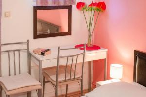 Postel nebo postele na pokoji v ubytování Damira Rooms