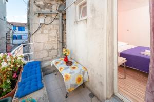 Postel nebo postele na pokoji v ubytování Damira Rooms