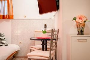Postel nebo postele na pokoji v ubytování Damira Rooms
