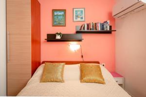 Postel nebo postele na pokoji v ubytování Damira Rooms