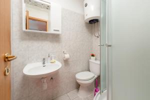 Koupelna v ubytování Damira Rooms