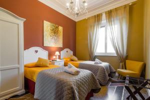 Posteľ alebo postele v izbe v ubytovaní Casa Vittoria