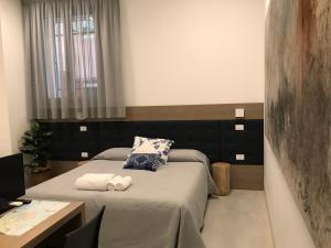 Postel nebo postele na pokoji v ubytování Al Pozzo di Luce Venezia Suites