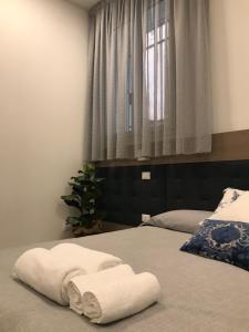 Postel nebo postele na pokoji v ubytování Al Pozzo di Luce Venezia Suites