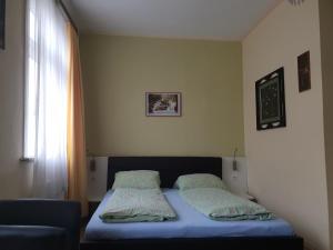 Postel nebo postele na pokoji v ubytování Hotel Alte Post