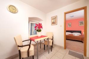 Postel nebo postele na pokoji v ubytování Damira Rooms