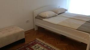 Postel nebo postele na pokoji v ubytování Cricket Park Hostel