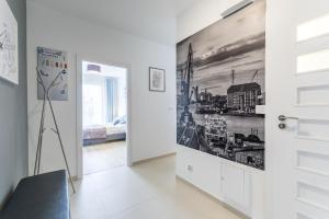 Televízia a/alebo spoločenská miestnosť v ubytovaní Anchor Apartments Vintage