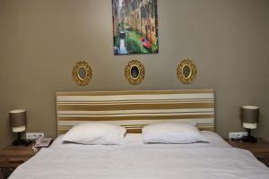 Postel nebo postele na pokoji v ubytování Adana City Boutique Hotel
