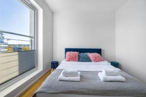 Posteľ alebo postele v izbe v ubytovaní Apartament Olsztyński - Lake Apartments, osiedle Calamo Park - Olsztyn