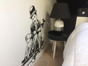 Posteľ alebo postele v izbe v ubytovaní Au lévrier de chessy