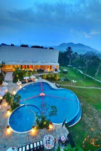 an overhead view of a swimming pool at a resort at Soll Marina Hotel & Conference Center Bangka in Pangkal Pinang