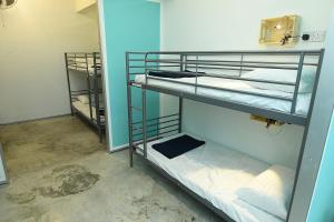 Katil atau katil-katil dalam bilik di SHA LA LA