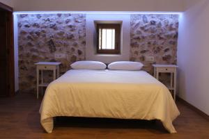 Cama o camas de una habitación en El Retiro del Pilar