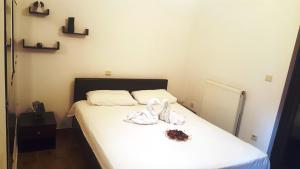Postel nebo postele na pokoji v ubytování Horizon apartment Athens near to Acropolis, sea & subway