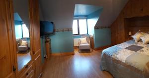 Postel nebo postele na pokoji v ubytování Leroy´s Lodge