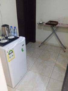Küche/Küchenzeile in der Unterkunft فندق اوقات الراحة للوحدات السكنيه