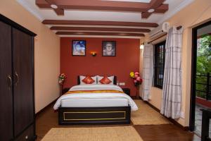 Voodi või voodid majutusasutuse Gurung's Home toas