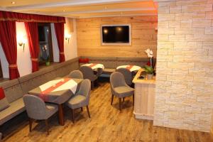 TV a/nebo společenská místnost v ubytování ApartHotel Holzerhof