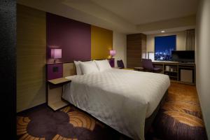 Postel nebo postele na pokoji v ubytování Sunshine City Prince Hotel Ikebukuro Tokyo