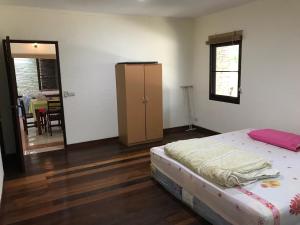 Postel nebo postele na pokoji v ubytování Klang Dong Mountain View - Khao Yai