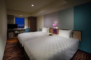 Postel nebo postele na pokoji v ubytování Sunshine City Prince Hotel Ikebukuro Tokyo