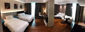 Higher Hotel客房内的一张或多张床位