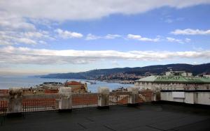 a view of a body of water from a balcony at Residence Liberty in Trieste
