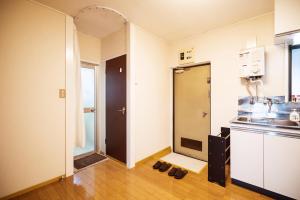 Virtuvė arba virtuvėlė apgyvendinimo įstaigoje Murata Corpo 305