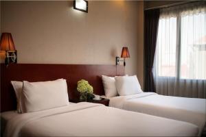 Voodi või voodid majutusasutuse Sen Hotel - Managed by Sen Hotel Group toas