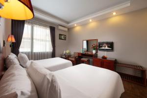 Voodi või voodid majutusasutuse Sen Hotel - Managed by Sen Hotel Group toas